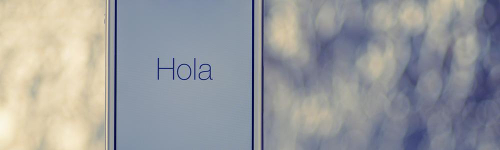 en telefon och det spanska ordet hola