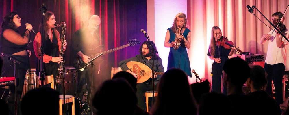 World music ensemble on stage during the winter concert in december 2023