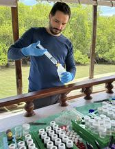 Alex Cabral with water samples 